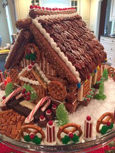 a large gingerbread house made to look like it has been decorated