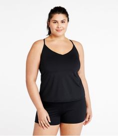 Paddle, swim or soak up the sun in a swimsuit designed for it all. This fresh, flattering tankini offers non-stop support and a just-right fit for all-day comfort in and out of the water. From strap joint at neck to hem is 18". Fitted: Sits close to the body. Falls at high hip. In a quick-drying blend of 82% recycled nylon and 18% Lycra®. Lining in a soft blend of 95% polyester and 5% spandex. Abrasion-resistant fabric stays in good condition after multiple washes and wears. UPF 50+ fabric block Fabric Blocks, Active Swimwear, Top Swimwear, Black Tankini, Swimsuit Design, Active Outfits, Soak Up The Sun, Women's Swimwear, Non Stop