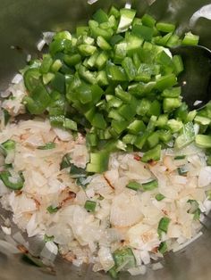 onions and celery are mixed together in a bowl