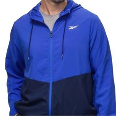 Item: Men’s Reebok Full Zip Training Woven Jacket With Pockets And Drawcord-Adjustable Hood Size: Xl Color: Blue Condition: New With Tag Materials: 100% Polyester Measurements: Approx. 25.5 Inches Across The Chest, & 30 Inches In Length All Items Come From A Smoke Free, Pet Friendly Home. Reebok Retro, Men's Activewear, Brand Reputation, Vintage Reebok, Jacket With Pockets, Woven Jacket, Pullover Windbreaker, Reebok Classic, Coat Design