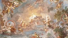 an ornate painting on the ceiling of a building with angels and other people around it