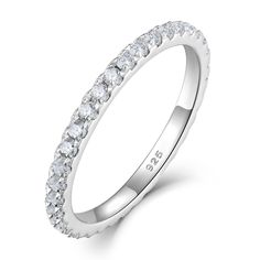 a white gold wedding band with rows of diamonds