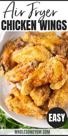 chicken wings on a white plate with the words air fryer chicken wings over it