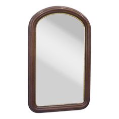 a wooden mirror with an arched frame and gold trim around the edges, on a white background