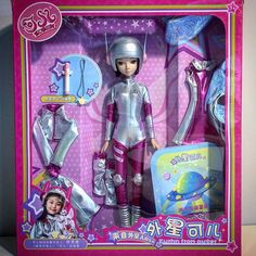 the doll is in its box with accessories