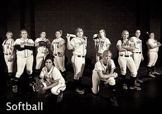 black and white photograph of softball players posing for a team photo with the caption softball