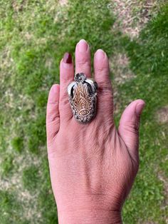 This listing is for 1 piece. At wholesale price Hand carved  buffalo bone ring is absolutely stunning with beautiful adjustable band. You will receive the exact ring shown in the pictures. This high quality durable statement piece ring is handmade in Nepal. Beauty of this ring that is unmatched as they are handmade and are one of a kind.  With the nature of them being handmade, each product is unique in its own right and no two products are the exact same.  Made with Tibetan Silver and Buffalo Bone Ring Size: Adjustable (One size fits most) can size up or down Measurement: approximately 45 mm X 30 mm, Weight: 18.10 gm DS: 0350 Disclaimer: Items are handmade so please note: Each item is unique may have some small imperfections. There can be a slight difference in actual color than shown in Unique Adjustable Engraved Flower Ring, Unique Carved Adjustable Rings, Artisan Carved Adjustable Ring, Nepal Beauty, Tibetan Ring, Bone Ring, Hand Of God, Ring Hand, Jewelry Hand