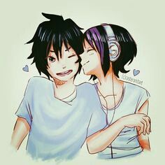 two people are hugging each other with headphones on