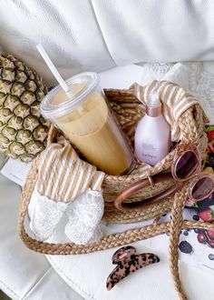 pineapple, sunglasses, and other items on a chair