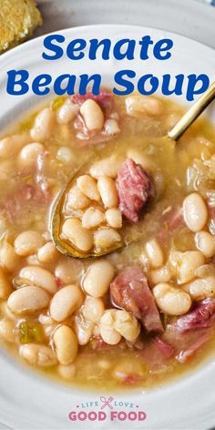 a white plate topped with beans and ham