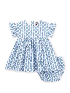 Spring has sprung on this delicate floral Ruffle Sleeve Baby Dress. Couldn't be sweeter with ruffle sleeves, gathered skirt, and center back button placket closure. A pair of matching bloomers are included for all sizes. So comfy, the dress and bloomers are fully lined and made of breezy and lightweight 100% cotton poplin.  Matching family styles are available in our <a href="https://www.teacollection.com/sibling-shop">Sibling Shop</a>. Spring Has Sprung, Tea Collection, Gathered Skirt, Floral Ruffle, Ruffle Sleeves, Dress Blue, Button Placket, Cotton Poplin