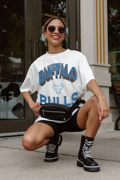 Game day just got better with our oversized crewneck tee. This relaxed fit, short sleeve crewneck tee with ribbed neckline is a versatile addition to any wardrobe. Crafted from 100% cotton, it promises a soft touch and lasting durability. Perfect for fans who want to be super comfortable without sacrificing style! Buffalo Bulls, Oversized Crewneck, Ribbed Neckline, Game Day, Buffalo, Fitness Models, Slip On, Relaxed Fit, Crew Neck