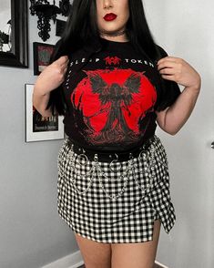 I wish I could go back in time and experience Sleep Token live again for the first time. 🥹🖤 What concerts are you looking forward to? I’m going to see Dayseeker in October and they’ve been on my bucket list for a while now! Outfit Details Sleep Token Band Shirt: @hottopic Loop Chain Waistbelt: @sheincurve Buffalo Plaid Skort: @sheincurve Code: NikkiQ215 for 15% off Shein #hottopic #htfanatic #sleeptoken #alternativefashion #htfandom Sleep Token Band, Goth Ideas, Plaid Skort, Sleep Token, Goth Outfit, Go Back In Time, My Bucket List, Goth Style, Concert Fits