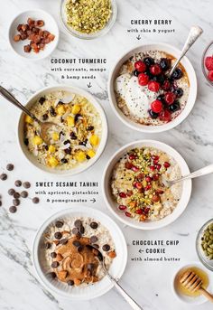 the ingredients for an oatmeal bowl laid out on a marble counter top