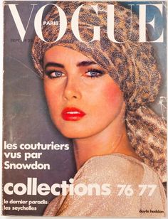 a magazine cover with a woman's face wearing a head wrap on the front