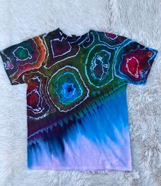 a t - shirt with an abstract design on it