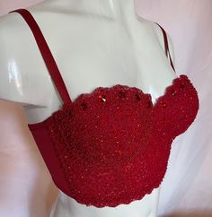 Meticulously designed and hand-beaded half corset in red color. Perfect for every occasion. Matching color beads and sequins all over the front part of the bra. 1. Available in 4 sizes: XS, S, M, and L. 2. Many satisfied customers. 3. Three rows of hooks and eye closure at the back for better adjustment to your size (see pic). 4. Adjustable shoulder straps. 5. Individually hand decorated. 6. Amazing craftsmanship, yet reasonably priced. 7. Items located in the US to ensure fast order processing Red Corset Aesthetic, Surprise Dance Outfits Quinceanera Red, Quinceanera Surprise Dance Outfits, Surprise Dance Outfits Quinceanera, Quince Surprise Dance Outfits, Quince Shirts, Half Corset, Red Bustier Top, Christmas Red Color