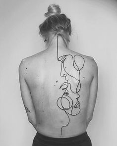 a woman's back with a line drawing on it