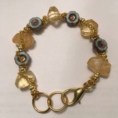 Lovely, # 2 Citrine, Semi Precious, Stone Bracelet with goldtone chain/findings, and Czech Glass in Mint, Copper and Amber colorations. Rosary Beads Necklace, Semi Precious Stone Bracelet, Semi Precious Stone, Arm Candy, Stone Bracelet, Cute Jewelry, Czech Glass, Boho Jewelry, Semiprecious Stones