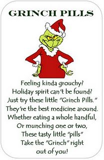 an image of the grinch pells christmas card on a cell phone with caption