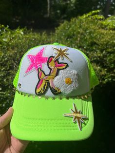 Summer fun, lime green and white foam front trucker hat. Iron on patches including a balloon animal dog, gold star chain, adjustable snap back. One Size. Trendy Baseball Cap With Patches, Trendy Summer Snapback Hat With Embroidered Patch, Trendy White Trucker Hat With Patches, Trendy Embroidered Snapback Hat For Summer, Fun Green Trucker Hat For Summer, Green Hip Hop Trucker Hat Snapback, Fun Green Summer Trucker Hat, Trendy Yellow Trucker Hat For Spring, Trendy Spring Trucker Hat With Patches