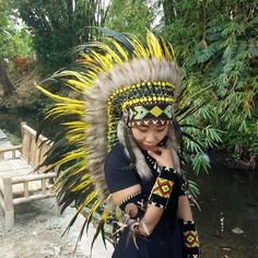 Yellow Feather Indian Headdress Replica This Headdress is 100% handmade from feathers. * Head circumference: 59 centimeters / 23 inches * Length : Medium * Beads color and pattern may vary each headdress WHY US? * 100% Handmade and Eco Friendly Product * Finest Quality - Each item will go through a Quality Control process before shipping. * No Markup Price * Every purchase supports Balinese Artisans - All Artisans will keep on following their passions while providing for their families. SHIPPING Carnival Festival Costume Hats With Feathers, Fitted Feather Costume Hat, Bohemian Fitted Costume Hats And Headpieces For Festival, Bohemian Festival Hats And Headpieces For Carnival, Bohemian Fitted Festival Costume Hats And Headpieces, Bohemian Costume Hats And Headpieces With Feathers For Festivals, Festival Costume Hat With Feathers, Festival Feathered Costume Hat, Festival Costume Hats And Headpieces With Feathers