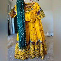 Yellow Lehenga With Peacock Details. Hand Embroidery. With Green Dupatta. Bust Size 32 Space To Open Up To 4ins. Green Dupatta, Yellow Lehenga, Open Up, Lehenga, Hand Embroidery, Size 4, Embroidery, Yellow, Green