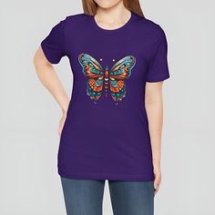 VIBRANT BUTTERFLY T-SHIRT - BOLD AND COLORFUL GRAPHIC TEE Embrace the beauty of nature with our Vibrant Butterfly T-Shirt, featuring an intricately designed butterfly in a stunning array of blue, orange, and red hues. This eye-catching design is perfect for adding a splash of color and style to your wardrobe. WHY YOU'LL LOVE IT This t-shirt isn't just a piece of clothing; it's a wearable piece of art. Whether you're a nature enthusiast, an art lover, or someone who enjoys unique fashion, this bu Trendy Short Sleeve T-shirt With Butterfly Print, Relaxed Fit Short Sleeve T-shirt With Butterfly Print, Vibrant Butterfly, Casual T-shirt With Butterfly Print, Cute Spring Butterfly Print T-shirt, Butterfly T Shirt, Animal Love, Butterfly Shirt, Nature Enthusiast