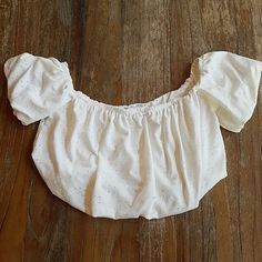 New Without Tags And Never Worn. Super Soft And Stretchy Crop Top In Soft White. Measurements Laying Flat Are 8" Length, 14" Across The Chest. Stretchy Crop Tops, Urban Outfitters Tops, Soft White, Urban Outfitters, Color White, Crop Top, Womens Tops, Crop Tops, Tags