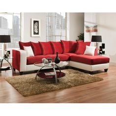 a red and white sectional sofa in a living room