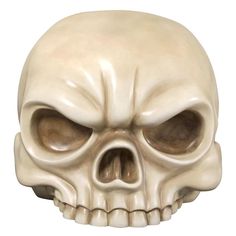 a white skull with brown eyes on a white background