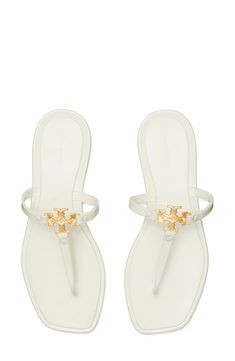 Make a playful retro statement with this carefree jelly sandal topped with polished logo hardware. Flat sole Synthetic upper, lining and sole Imported Tory Burch Jelly Sandals, Hoco Shoes, Wedding Reception Outfit, Reception Outfit, Tory Burch Sandals, Jelly Shoes, Gold Fabric, Jelly Sandals, White Sandals