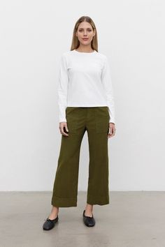 Featuring a pinwale corduroy (this is the skinniest, least bulky type) these casual trousers are fab. With a cropped, wide leg and utility details like patch pockets on the front and rear, these bottoms have a slightly higher rise that hits at the natural waist. A flattering silhouette that is equally chic. Fall Wide-leg Pants With Patch Pockets, Wide-leg Pants With Patch Pockets For Fall, Fall Utility Wide Leg Pants With Relaxed Fit, Fall Utility Cropped Pants, Cotton Cropped Leg Cargo Pants For Fall, Everyday Fall Pants With Patch Pockets, Cropped Cargo Pants With Side Pockets For Fall, Versatile Fall Pants With Patch Pockets, Versatile Pants With Patch Pockets For Fall