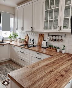 Small Modern Farmhouse Kitchen Ideas, White Wood Cabinets Kitchen, Kitchen Remodel Wood Countertops, Boho Kitchen Countertop, White And Brown Farmhouse Kitchen, White Kitchen Wooden Countertop, Small Vintage Kitchen Remodel, Cream Cabinets With Butcher Block Top, Clean Aesthetic Kitchen