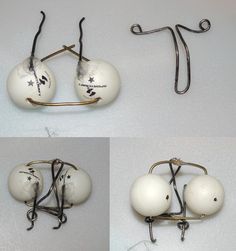 four different pictures of white balls attached to metal hooks and hanging on the wall in various positions