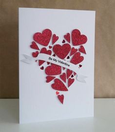 a card with hearts cut out of it