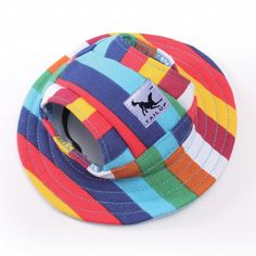 a multicolored hat with a dog on it