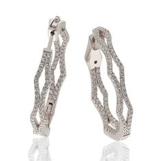 These dazzling and radiant Suzy Levian sterling silver cubic zirconia hoop earrings will add sparkling sophistication to your ensemble. These earrings feature sparkling white pave-set cubic zirconia on the inside and outside of the hoops. The wavy designs of two pave wavy bands coming together and moving apart create a modern take on a clasic look. These designer Suzy Levian earrings come in sterling silver or rosed sterling silver to make the perfect match for the look you're wishing for. Pave Hoop Earrings, Modern Hoop Earrings, Gemstone Brooch, Cubic Zirconia Bracelet, Cubic Zirconia Necklace, Cubic Zirconia Jewelry, Jewelry Rings Diamond, Cubic Zirconia Earrings, Cubic Zirconia Rings