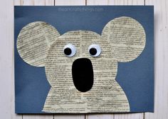 a paper cut out of a koala with googly eyes