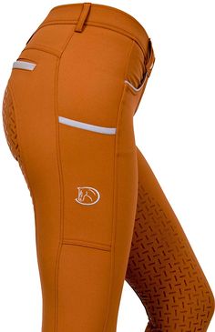 the side view of a woman's leggings in orange