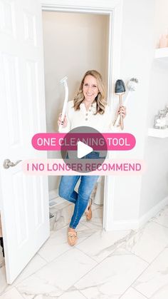 a woman standing in front of a door holding a hairdryer and brush with the words one cleaning tool i no longer recommend