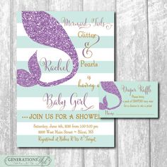 the mermaid baby shower party is set up on a wooden background with purple and blue glitter