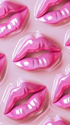 many pink lips are arranged on a white surface