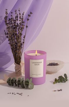 What it is: A limited-edition, clean-burning scented candle made with premium fragrance oils and housed in a chic matte-lilac glass vessel.Fragrance story: Lavender Daze recalls an oasis of calm-inducing wild lavender fields: the rich floral aroma of Bulgarian lavender fuses with soothing bucolic notes of green meadow grass, peonies and eucalyptus leaves. Style: Floral.Notes:- Top: wild lavender- Middle: meadowgrass- Base: eucalyptus 3" x 4.3" 10 oz. 70-hour approximate burn time Cruelty-free Pa Peonies And Eucalyptus, Wild Lavender, Brooklyn Candle Studio, Lavender Scented Candle, Green Meadow, Lilac Blossom, Spring Candles, Candle Studio, Lavender Aesthetic