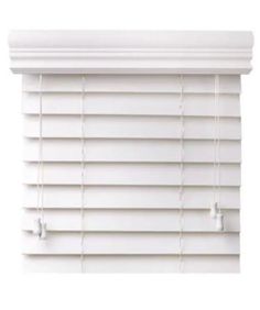 a white window blind with the blinds closed