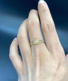 This a lovely dainty 14K Gold Rose/Flower Ring with a small diamond in the center for a splash of sparkle. An elegantly simple piece of jewelry to add to your ring collection. Stack it on top of your bands or wear it on its own, it will look great either way. ~ 14K Yellow / White/ Rose Gold ~ Natural Diamond Center Stone Look out for our listing for this ring with different color natural gemstones ▬ All jewelry pieces are sent in a gift box ♥♥ ▬ Our shipping and return policies: ~ Items will be Delicate Yellow Gold Ring With Center Stone, Elegant Rose Gold Flower Ring With Birthstone, Elegant 14k Gold Flower Ring With Rose Cut Diamonds, Elegant Gold Birthstone Ring With Rose Cut Diamonds, Dainty Rose Gold Birthstone Ring With Diamond Accents, Delicate Gold Diamond Ring With Center Stone, Elegant Rose Cut Diamond Birthstone Promise Ring, Dainty 14k Gold Diamond Ring With Center Stone, Elegant Birthstone Ring With Rose Cut Diamonds For Promise