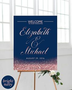 a welcome sign with pink and blue glitter