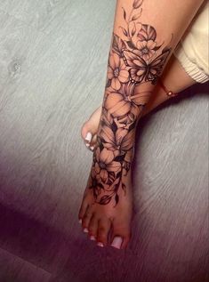 Half Sleeve Designs For Women, Red Ink Collarbone Tattoos For Women, Blessed Leg Tattoo, Lilly Leg Tattoo, Front Leg Tattoos Women, Tattoo Ideas Big Pieces, Front Shin Tattoo, Floral Foot Tattoos For Women, Ankle Sleeve Tattoo