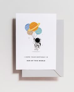 a birthday card with an image of a dog holding balloons that say, i hope your birthday is out of this world