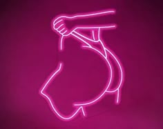 a pink neon sign with a hand holding a baseball bat in it's right arm